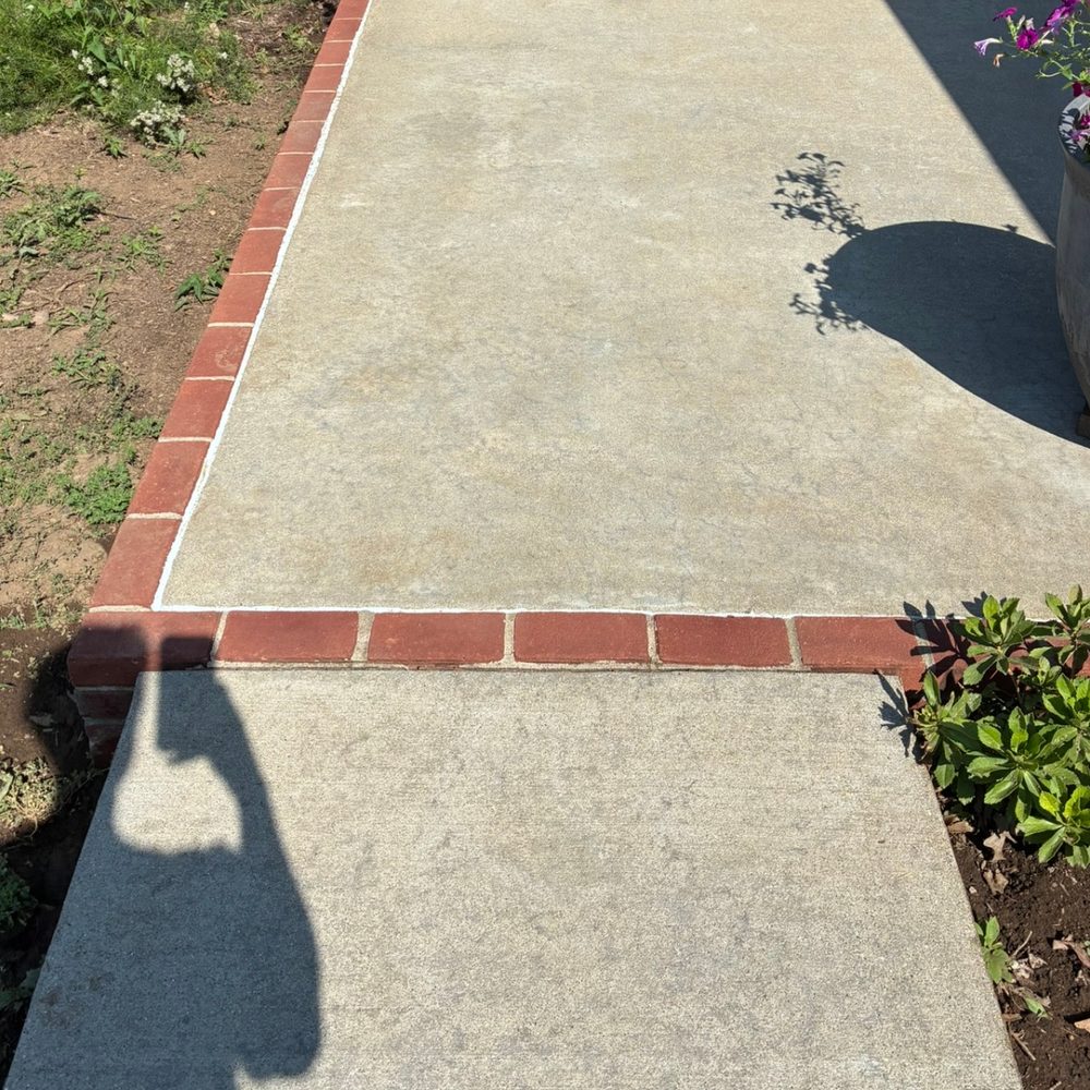 Same patio after pressure washing, second angle