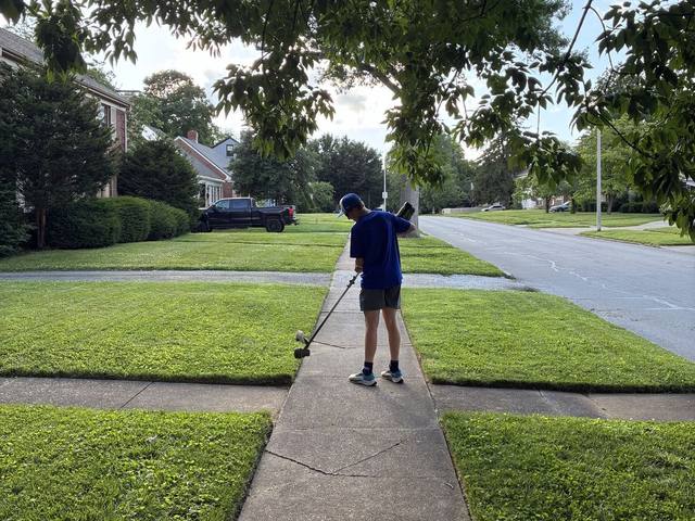 Mowing job — crew on the trim line